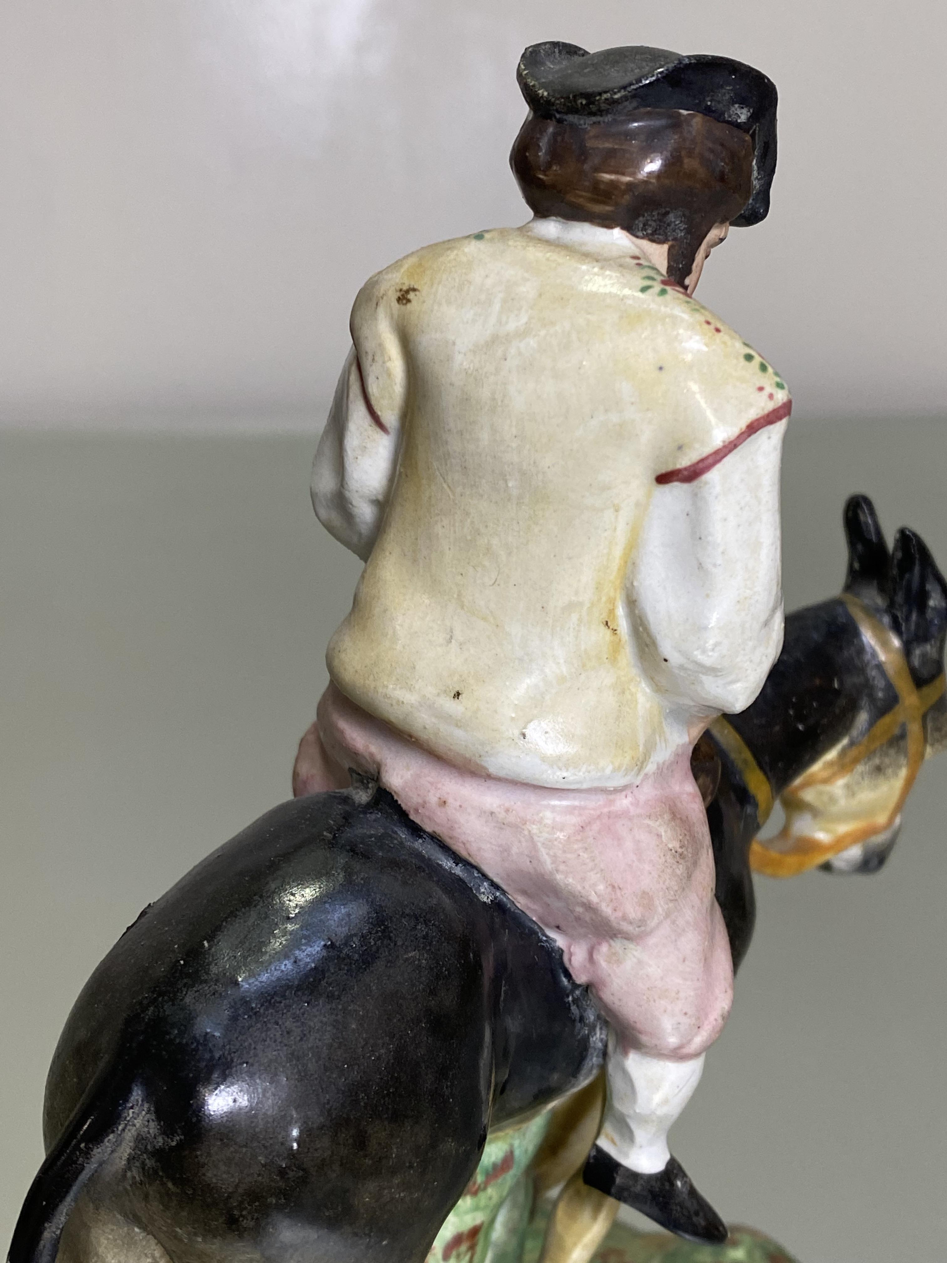 A 19th century Staffordshire figure of Sancho Panza, on a naturalistic base. Height 19.5cm - Image 4 of 5