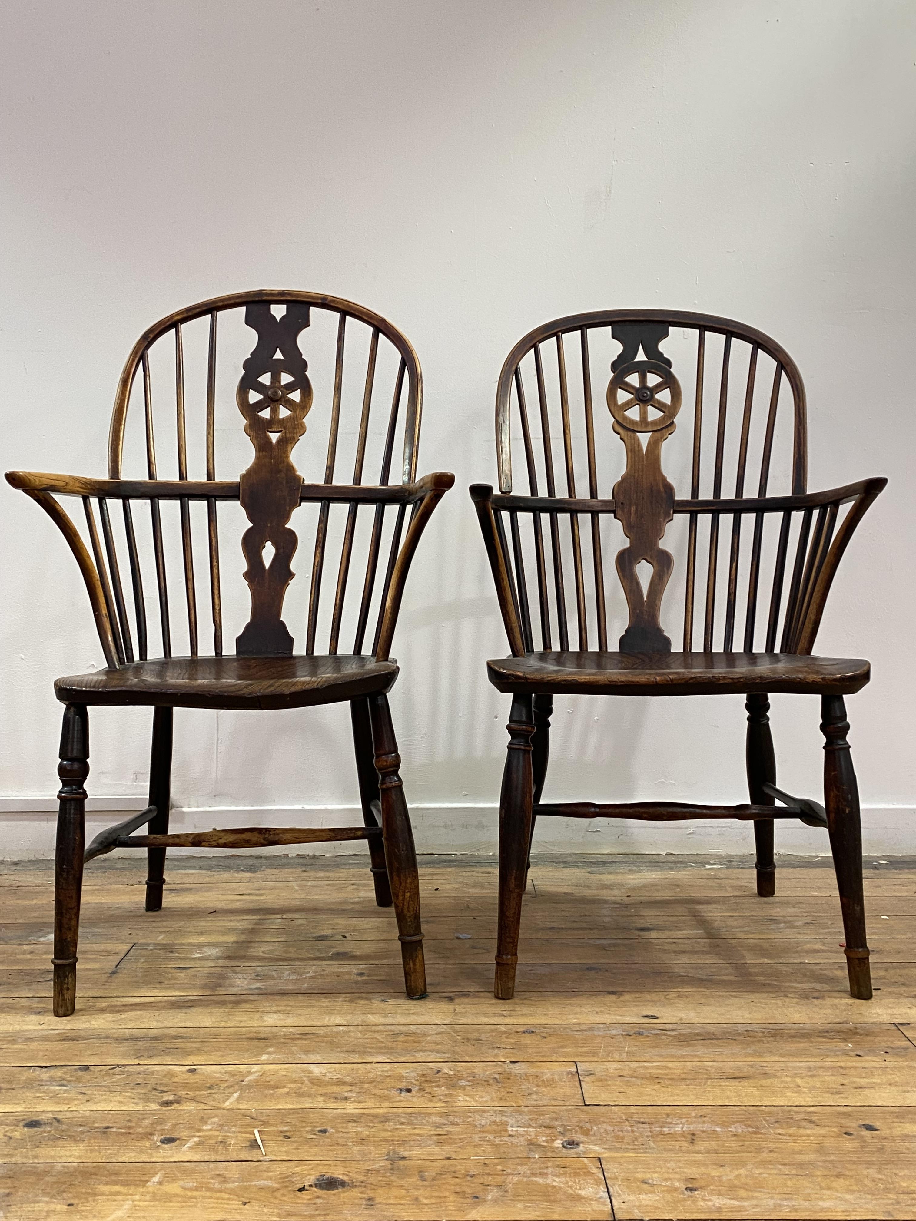 A matched pair of early Victorian elm, ash, and fruitwood Windsor armchairs, each double hoop and - Image 2 of 3