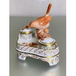 A Herend porcelain inkstand in the Chinese Bouquet (rust) pattern, the double wells each with