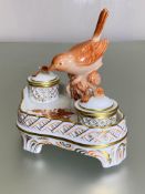 A Herend porcelain inkstand in the Chinese Bouquet (rust) pattern, the double wells each with