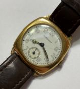 A 1940's 9ct gold Longines gentleman's wristwatch, the white enamel dial with Arabic numerals and