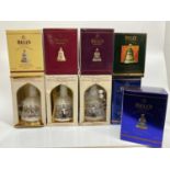 Whisky - nine bottles, Bell's Royal Commemorative and Christmas decanters, each boxed