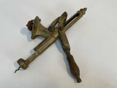 Antique brass 'Shamrock' bar corkscrew with lever action and turned beech handle, stamped and number