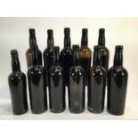 Port - ten bottles, unlabelled but believed pre 1920, some very low level, together with another sli
