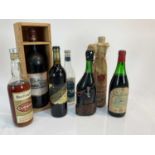 Eight bottles, magnum of Chateau Crusquet Sabourin 1986, Barolo 1961 etc