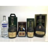 Cognac - three bottles, Hine V.S.O.P., Courvoisier V.S.O.P (2), a bottle of Grand Armagnac Janneau,