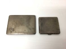 Two George V silver cigarette cases with engine turned decoration, various dates and makers