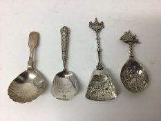 Four silver caddy spoons, including two continental and two Victorian