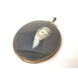Georgian portrait miniature of a gentleman, painted on ivory, in brass frame