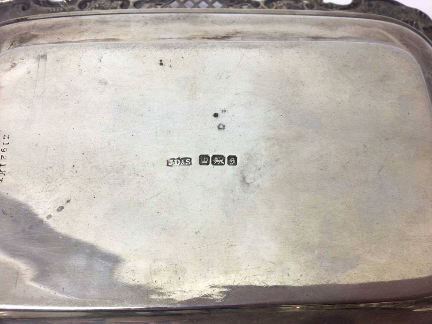 Three silver graduated rectangular dishes with pierced and floral decoration and one other oval silv - Image 2 of 7