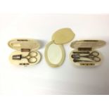 Two 19th century ivory cased etui cases and cased mirror