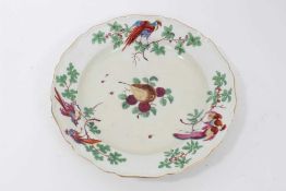 A Worcester plate, painted in the London atelier of James Giles with birds and fruits, circa 1770