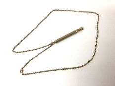 9ct gold cigar pricker and a yellow metal chain