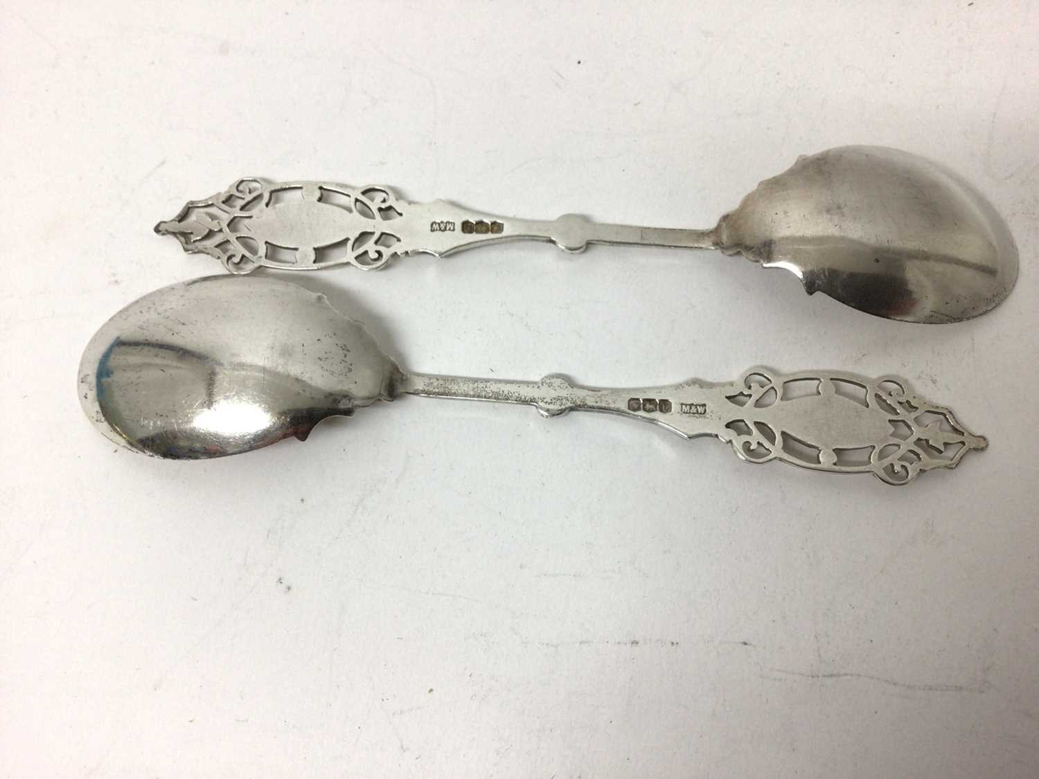 Pair of Mappin &Webb pierced and engraved silver spoons, Sheffield 1919, 16cm longs - Image 4 of 5