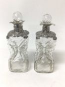 Pair Victorian silver mounted glass sherry decanters