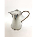 Arts & Crafts silver water pot with gimbled hinged lid and caned handle by Barker Bros. (Chester 192