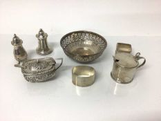 Group of miscellaneous silver to include two mustard pots, two pepperettes, a bonbon dish and two na