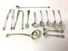 Collection of silver, including a pair of Tiffany sugar tongs, a Georgian pair of tongs, a small Geo