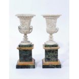 Fine pair of ivory campana vases, circa early 19th century and probably Italian, carved in relief wi