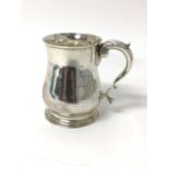 George II style silver pint tankard of baluster form, London 1938.
