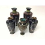 Five Japanese cloisonné vases, circa 1900, including two pairs and another, the largest measuring 15