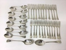 Quantity of silver flatware, including twenty-four matching forks (twelve dessert and twelve dinner)