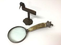 Early 20th century plated magnifying glass, together with a modern bronze sculpture