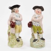 Two Pearlware-glazed 'Hearty Good Fellow' Toby jugs