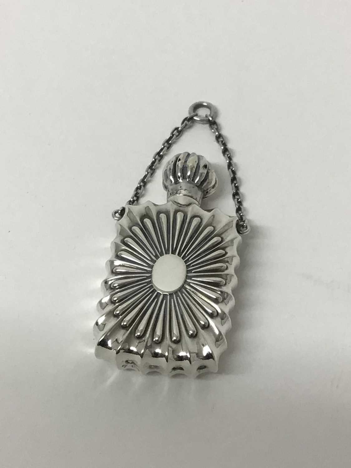 Victorian embossed silver scent flask with suspension chain possibly for use on a chatelaine hallmar