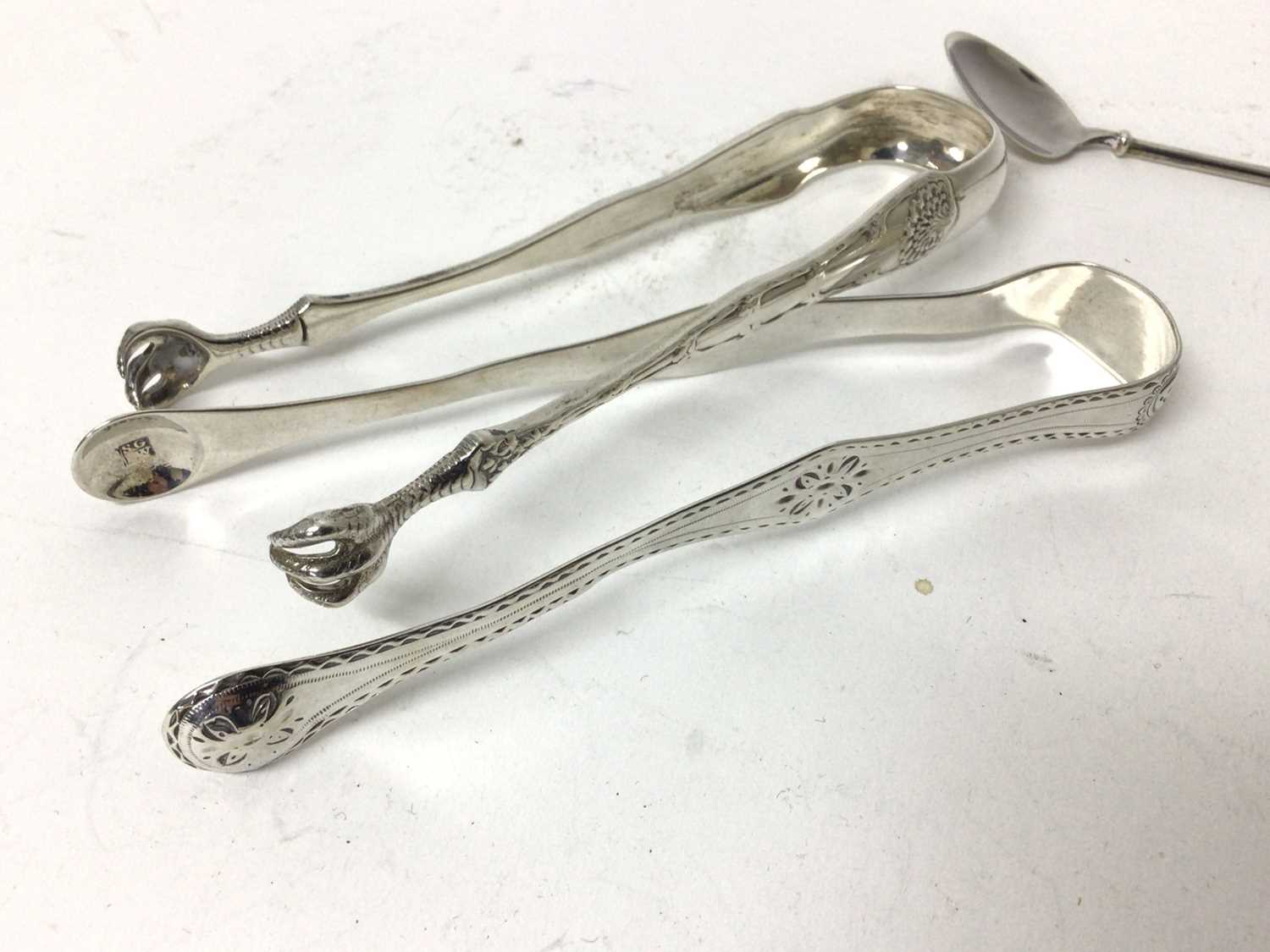 Collection of silver, including a pair of Tiffany sugar tongs, a Georgian pair of tongs, a small Geo - Image 2 of 5