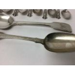 Pair of Georgian silver tablespoons, together with a set of eleven silver teaspoons, another set of