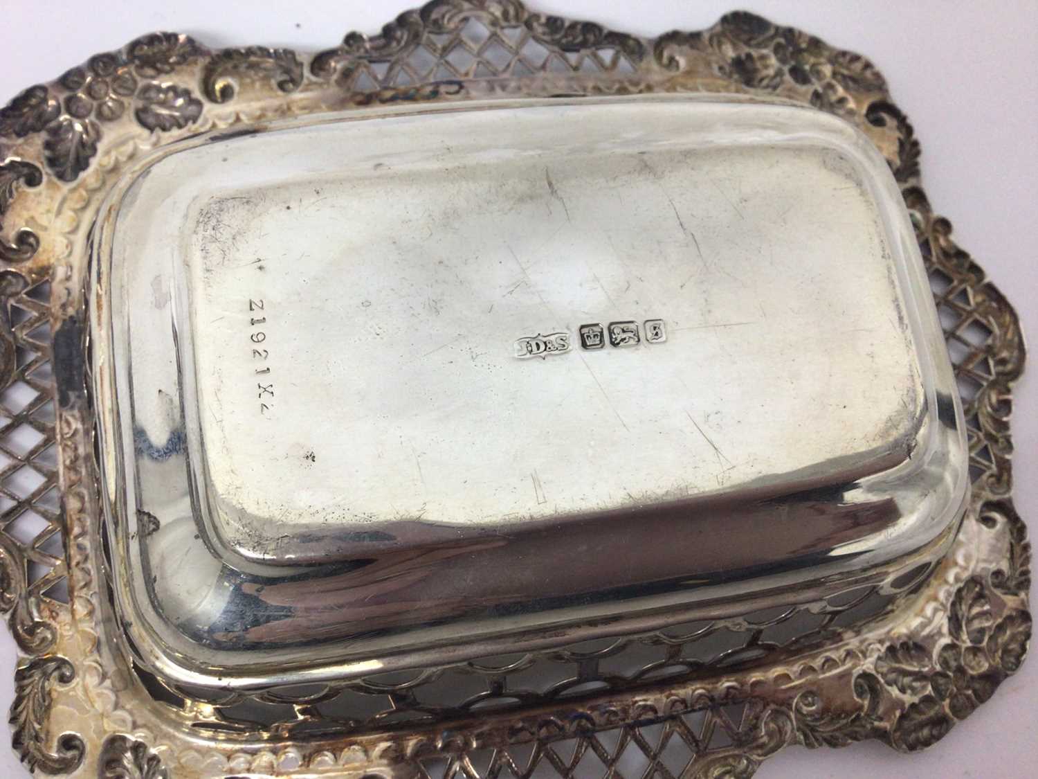 Three silver graduated rectangular dishes with pierced and floral decoration and one other oval silv - Image 4 of 7