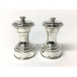 Pair of late Victorian silver pepper mills, hallmarked London 1899 maker John Grinsell & Sons