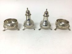 Sterling silver four-piece cruet set, London 1957 and 1968, with hoof feet