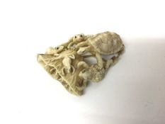 Unusual antique Japanese ivory model of a tortoise and a group of frogs, measuring 7cm long