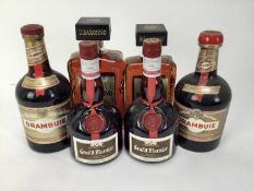 Six bottles - Disaronno, 700ml and 500ml, Grand Marnier (2) and Drambuie (2)