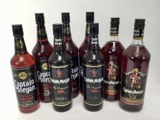 Rum - eight bottles, Captain Morgan, 40%, five 1 litre bottles, the other three 70cl