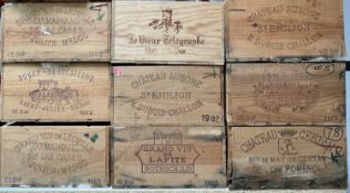 Nine empty wooden wine cases to include Lafite, Chateau Certan, Chateau Palmer and others