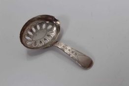George III silver caddy/sifter spoon with brite cut engraved decoration, (Birmingham 1821), marker I