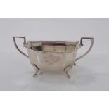 1930s silver sugar bowl of octagonal form with two angular handles raised on four pad feet, (Sheffie