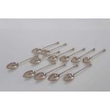 Set of twelve George V silver seal top tea spoons, each bowl engraved with a letter C, (Sheffield 19