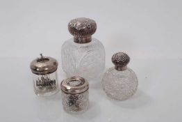 Large Victorian silver topped cut glass scent bottle (Birmingham 1890) together with an Edwardian si