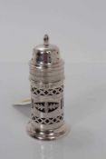 Edwardian silver sugar caster of lighthouse form, with pierced decoration and blue glass liner, (Bir