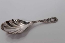 Edwardian silver shell bowl caddy spoon with cast floral leaf handle, Chester 1905, M.Friedlander &