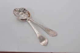 Pair of early 18th century Britannia silver spoons with later embossed and engraved decoration, mark