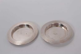Pair of George VI silver pin dishes of circular form with engine turned decoration to borders, (Lond