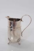 George V silver milk, raised on four claw and ball feet, (Birmingham 1910), maker J Sherwood & Sons,