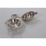 George VI silver tea strainer, (Birmingham 1943), together with another silver tea strainer (Birming