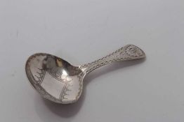 George III silver oval bowl caddy spoon with bright cut decoration, London 1800, Thomas Streetin 7.5