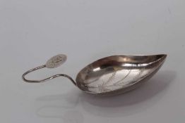 George III silver leaf-shaped bowl caddy spoon with bright cut decoration and wire loop handle , mar